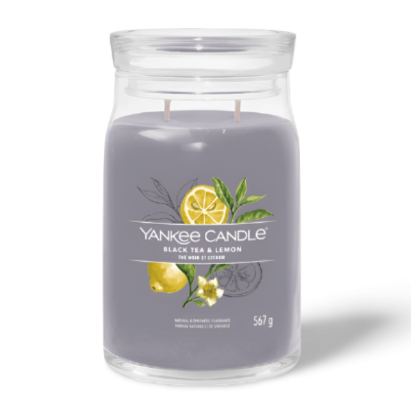 YANKEE Black Tea & Lemon Signature Candle in glass jar with dual wicks, citrus and tea-inspired scent with vanilla and creamy musk.
