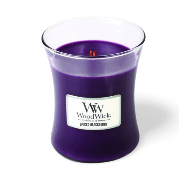 WOODWICK Spiced Blackberry candle with crackling wooden wick, rich berry colour wax, and warm bakery-inspired fragrance in glass jar.