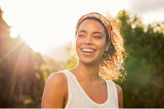 Women smiling 12 Evidence-Based Herbs and Supplements for Depression Relief - The Good Stuff