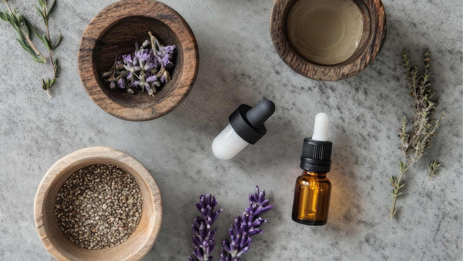 Assortment of natural aromatherapy ingredients, including lavender, oils, and herbal seeds, showcasing Phyto-Force Aromatherapy.