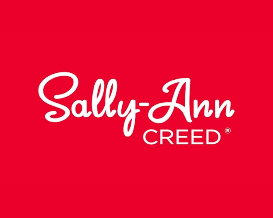 Sally-Ann Creed logo in bold white script on a vibrant red background, from The Good Stuff collection.