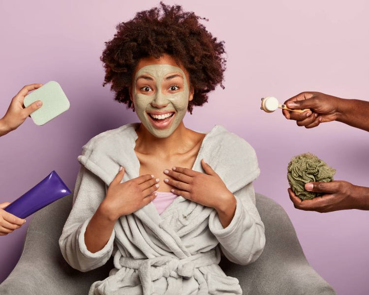 Skin and Body Care Products – smiling woman with clay face mask, spa tools around her, home pamper routine.